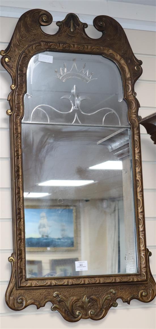 A fretwork mirror with etched crown W.55cm